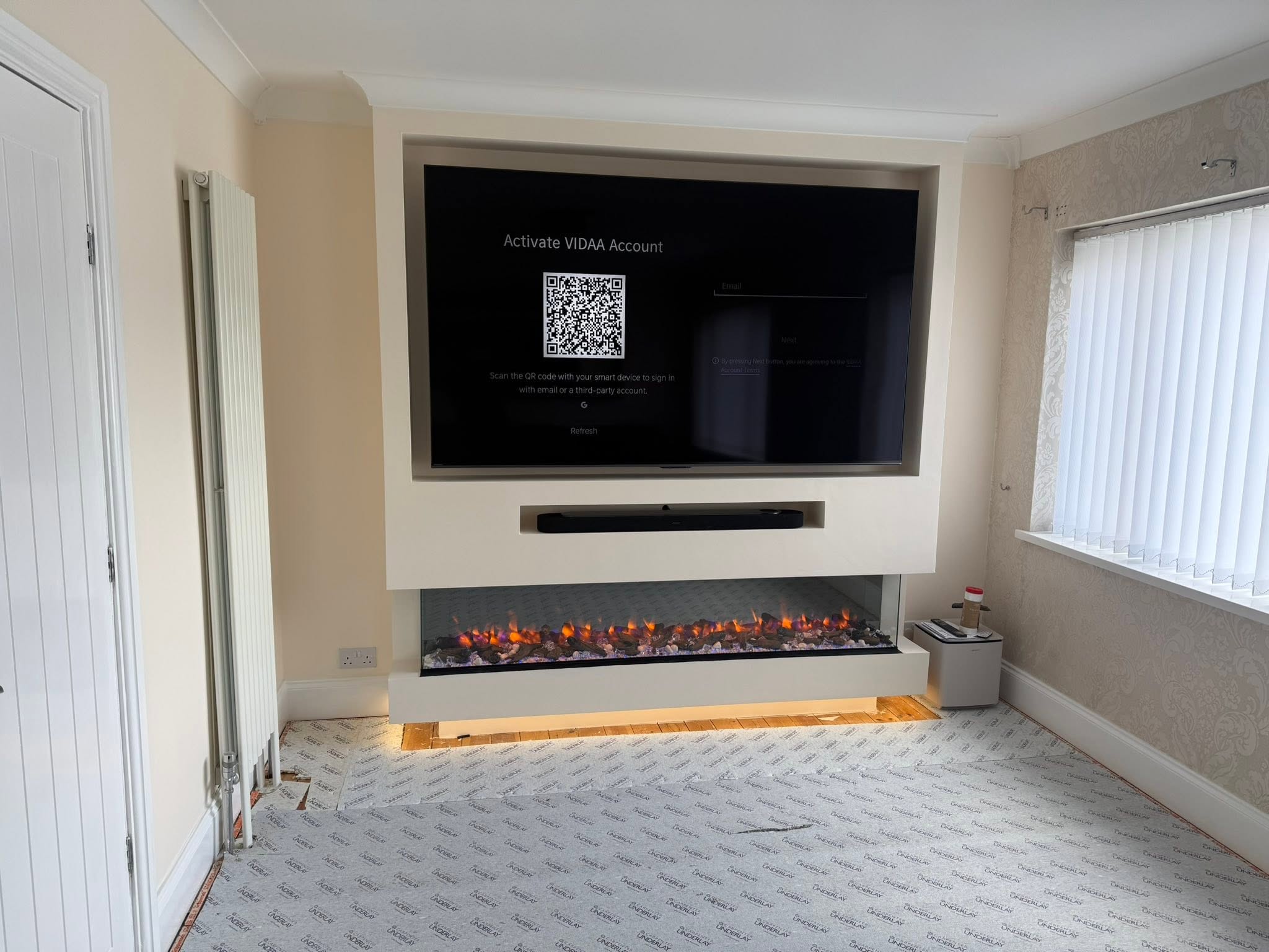 Bespoke media wall with integrated fireplace